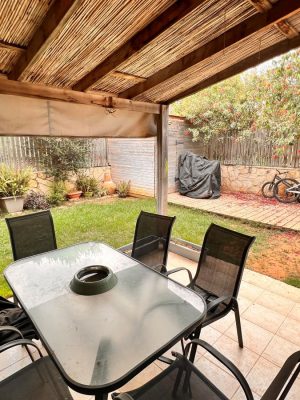 דוח משפחתי בסמוך לרחוב מלכי ישראל - הגינה